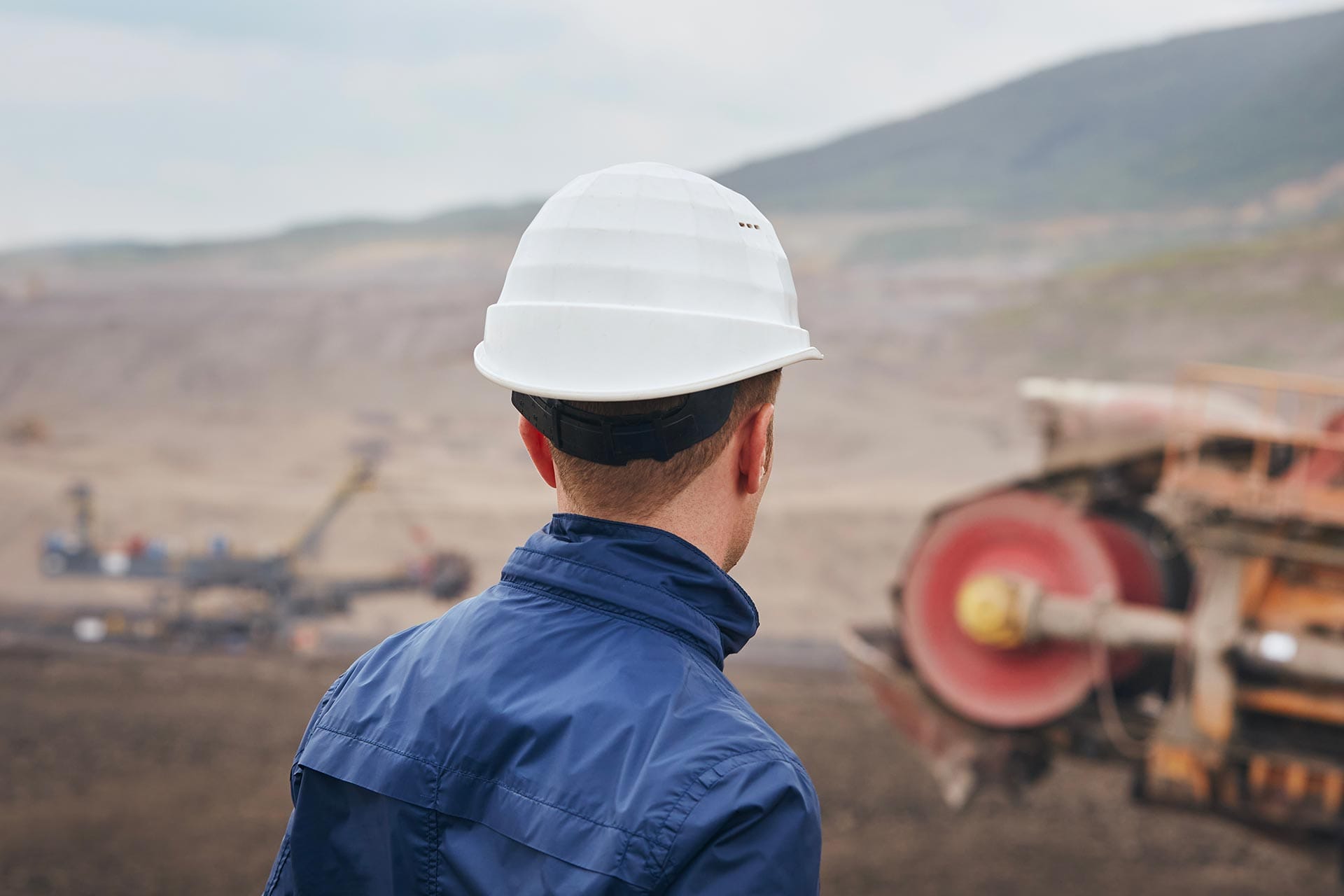 coal-mining-in-surface-mine-miner-looking-on-the-2023-11-27-05-30-10-utc.jpg